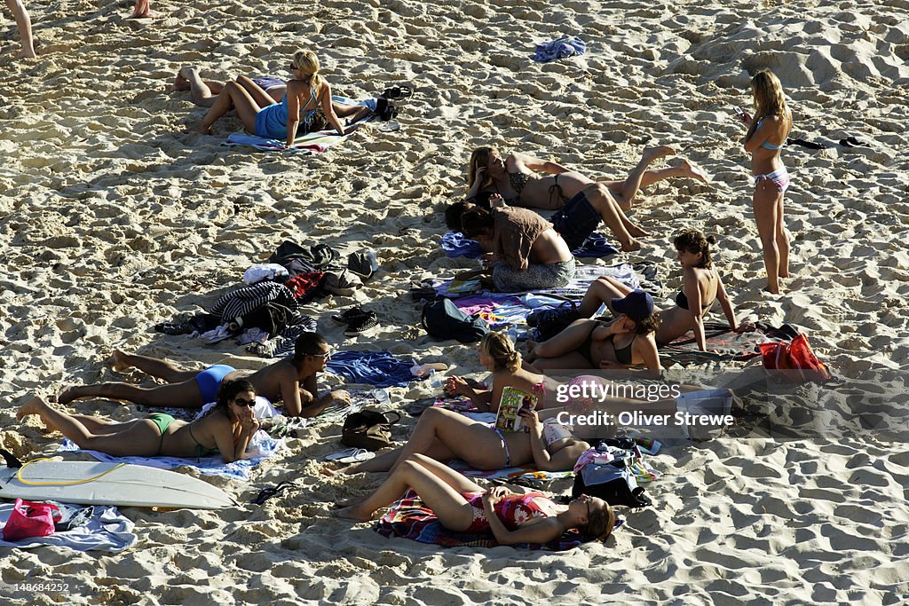 Overhead of sunbathers at Tamarama Beach.