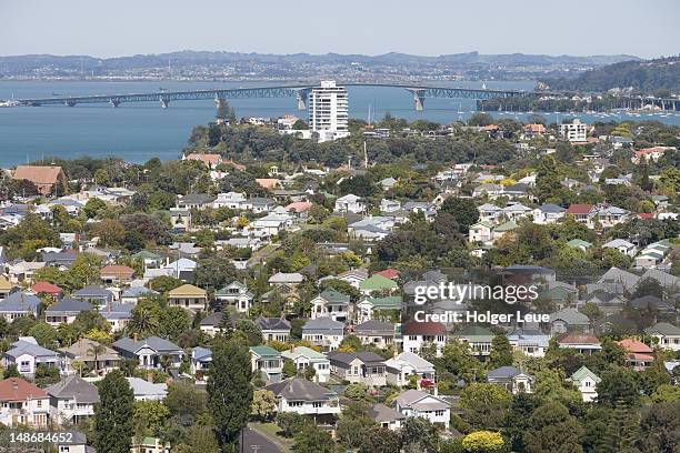 devonport with auckland harbour bridge in background, from mt victoria. - devonport auckland stock pictures, royalty-free photos & images