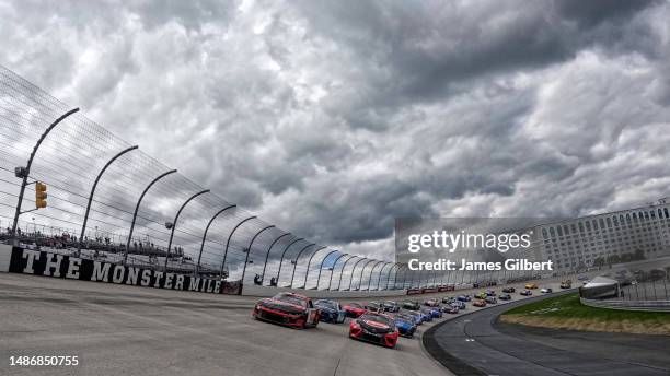 Kyle Busch, driver of the Lenovo Chevrolet, and Christopher Bell, driver of the Rheem Toyota, lead the field on a pace lap prior to the NASCAR Cup...