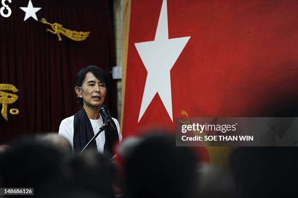 Myanmar opposition leader Aung San Suu Kyi speaks during a ceremony to mark the country's 65th anniversary of Martyrs' Day at the Martyrs' Mausoleum...