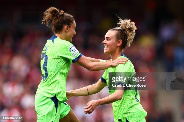 Jill Roord of VfL Wolfsburg celebrates after scoring the team's first goal with teammate Felicitas Rauch during the UEFA Women's Champions League...