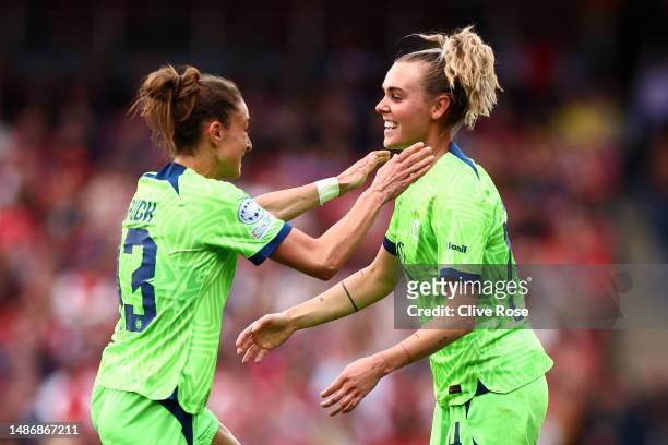 Jill Roord of VfL Wolfsburg celebrates after scoring the team's first goal with teammate Felicitas Rauch during the UEFA Women's Champions League...