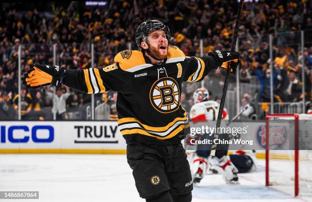 David Pastrnak of the Boston Bruins celebrates his third period goal against the Florida Panthers in Game Seven of the First Round of the 2023...