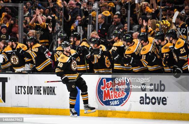 David Krejci of the Boston Bruins celebrates his second period goal with the bench against the Florida Panthers in Game Seven of the First Round of...