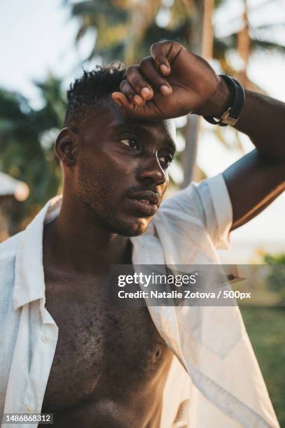 close-up portrait of african american man in open white shirt,ko pha ngan,thailand - natalie white model stock pictures, royalty-free photos & images