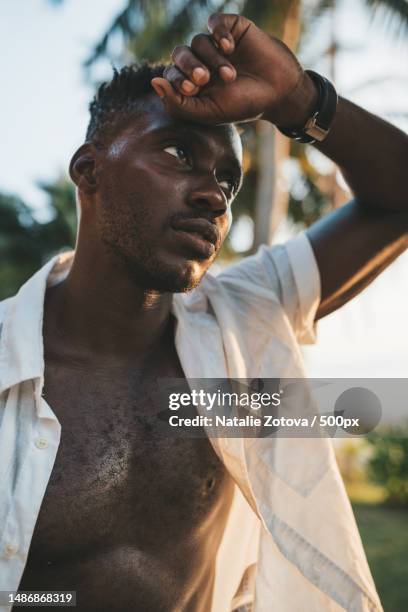 close-up portrait of african american man in open white shirt,ko pha ngan,thailand - natalie white model stock pictures, royalty-free photos & images