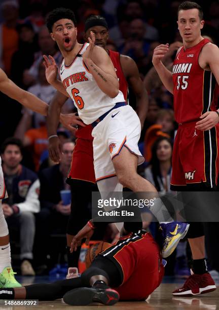 Quentin Grimes of the New York Knicks reacts after he is called for a foul in the second half against the Miami Heat during game one of the Eastern...