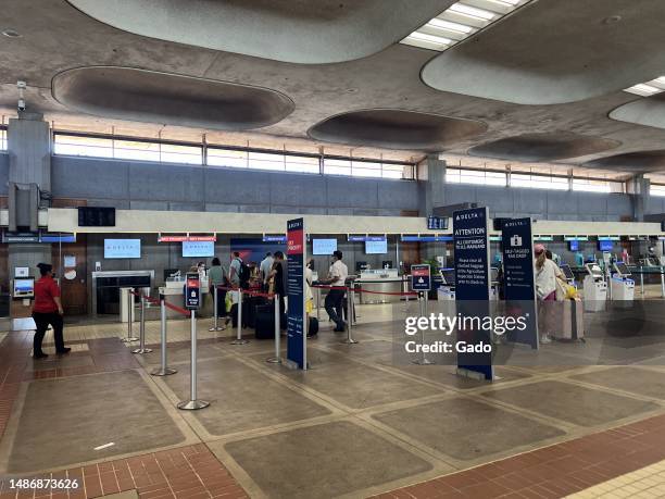 Checkin area with travelers and luggage visible at Kahului International Airport on Maui, Kahului, Hawaii, August, 2022. Photo courtesy Sftm.