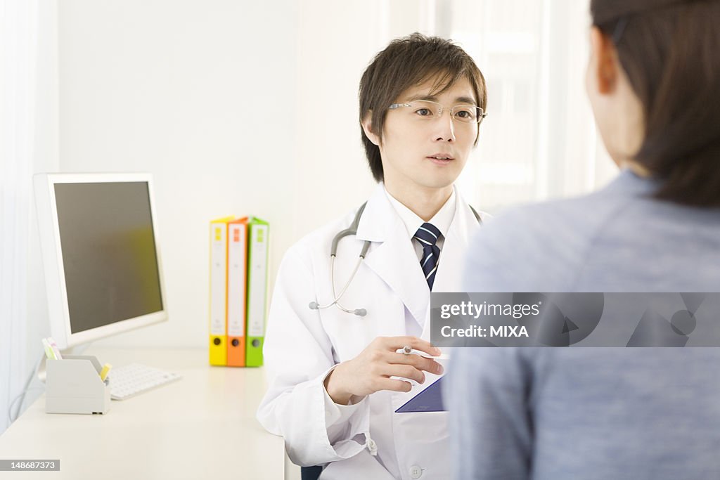 Doctor talking to patient