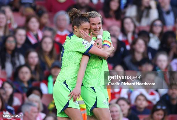 Alexandra Popp of VfL Wolfsburg celebrates with teammates after scoring the team's second goal during the UEFA Women's Champions League semi-final...