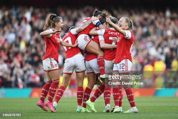 Jennifer Beattie of Arsenal celebrates with teammates after scoring the team's second goal during the UEFA Women's Champions League semi-final 2nd...