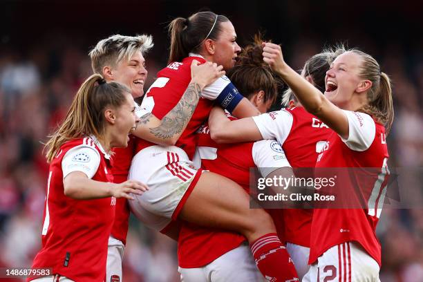 Jennifer Beattie of Arsenal celebrates with teammates after scoring the team's second goal during the UEFA Women's Champions League semi-final 2nd...