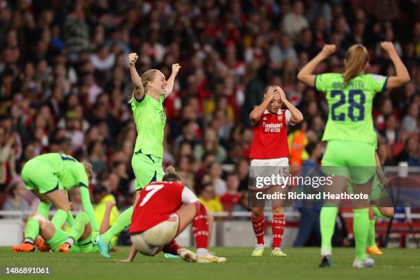 Players of VfL Wolfsburg celebrate after progressing to the Champions League Final after defeating Arsenal during the UEFA Women's Champions League...