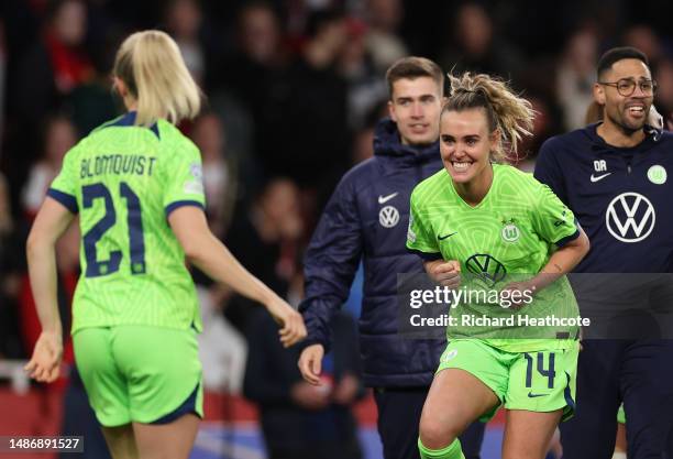 Jill Roord of VfL Wolfsburg celebrates victory with teammate Rebecka Blomqvist after progressing to the Champions League Final after defeating...