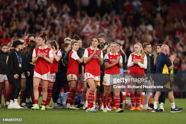 Players of Arsenal applaud the fans following their side's defeat to VfL Wolfsburg during the UEFA Women's Champions League semi-final 2nd leg match...