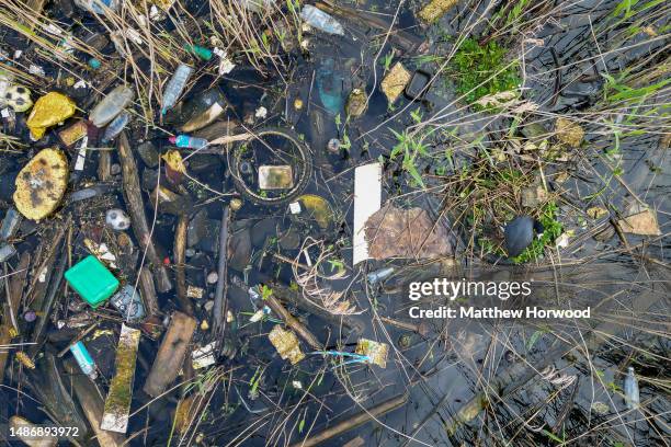 Plastic pollution in the River Taff near Cardiff Bay on April 29, 2023 in Cardiff, Wales.