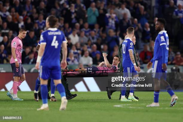 Seamus Coleman of Everton is stretchered off after going down with an injury during the Premier League match between Leicester City and Everton FC at...