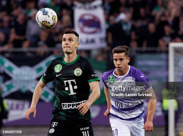 Amer Gojak of Ferencvarosi TC tries to control the ball in front of Luis Jakobi of Ujpest FC during the Hungarian OTP Bank Liga match between Ujpest...