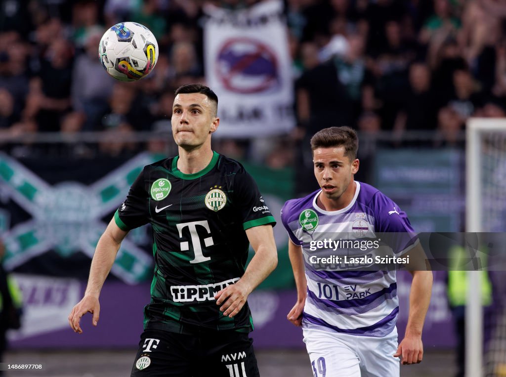 Amer Gojak of Ferencvarosi TC tries to control the ball in front