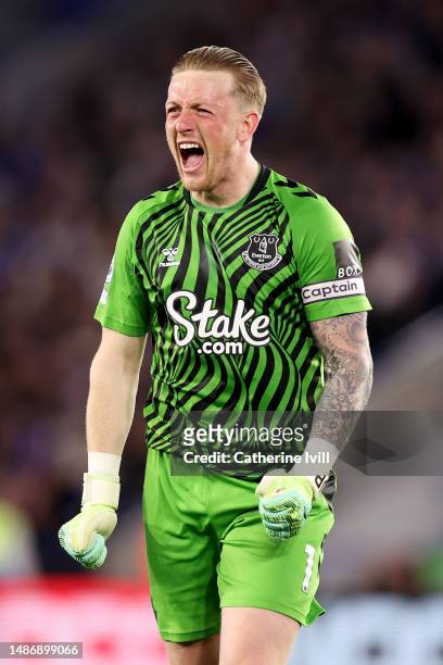 Jordan Pickford of Everton celebrates after Alex Iwobi scores the team's second goal during the Premier League match between Leicester City and...