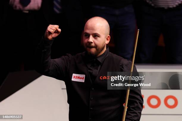 Luca Brecel of Belgium celebrates following victory in the Final match against Mark Selby of England on Day Sixteen of the Cazoo World Snooker...