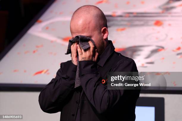 Luca Brecel of Belgium reacts following victory in the Final match against Mark Selby of England on Day Sixteen of the Cazoo World Snooker...