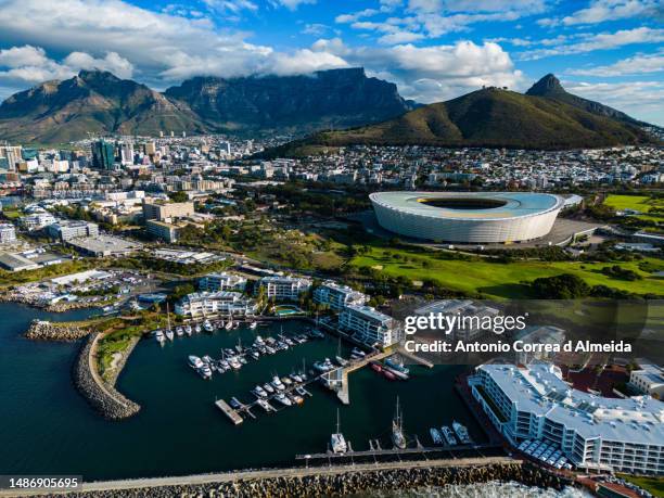 landscape aerial view of cape town with lions head and table mountain in south africa - cape town stadium stockfoto's en -beelden