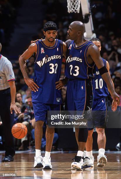 Guard Richard Hamilton of the Washington Wizards listens to guard Michael Jordan during the NBA game against the Memphis Grizzlies at the Pyramid...