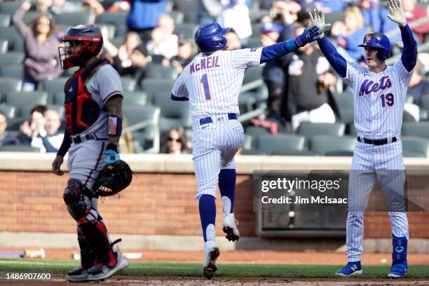 Jeff McNeil of the New York Mets celebrates scoring a run during the second inning against the Atlanta Braves in game two of a doubleheader with Mark...