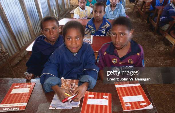 primary school children in classroom near mt hagen. - papua new guinea school stock pictures, royalty-free photos & images