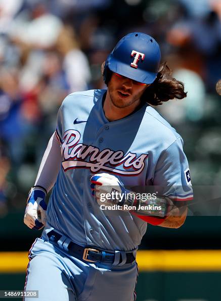 Texas Ranger Heim Jonah Heim of the Texas Rangers runs the bases after hitting a home ...