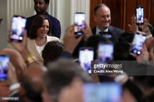 Vice President Kamala Harris and her husband Doug Emhoff arrive at a reception celebrating Eid-al-Fitr in the East Room of the White House on May 1,...