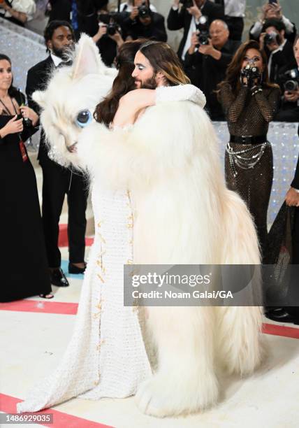 Anne Hathaway and Jared Leto, dressed as Karl Lagerfeld's cat Choupette, attend The 2023 Met Gala Celebrating "Karl Lagerfeld: A Line Of Beauty" at...
