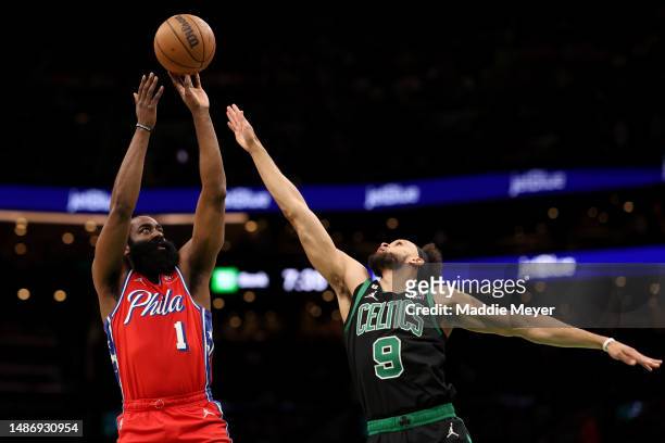 James Harden of the Philadelphia 76ers takes a shot against Derrick White of the Boston Celtics during the first quarter in game one of the Eastern...