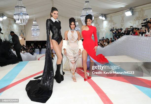 Kendall Jenner, Kim Kardashian, and Kylie Jenner attend The 2023 Met Gala Celebrating "Karl Lagerfeld: A Line Of Beauty" at The Metropolitan Museum...