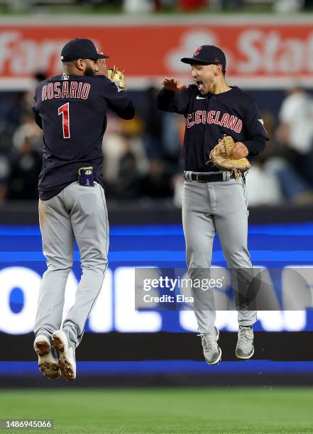 Amed Rosario and Steven Kwan of the Cleveland Guardians celebrate the win over the New York Yankees at Yankee Stadium on May 01, 2023 in Bronx...