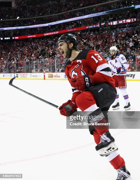 Nico Hischier of the New Jersey Devils celebrates a second period goal by Tomas Tatar against Igor Shesterkin of the New York Rangers in Game Seven...