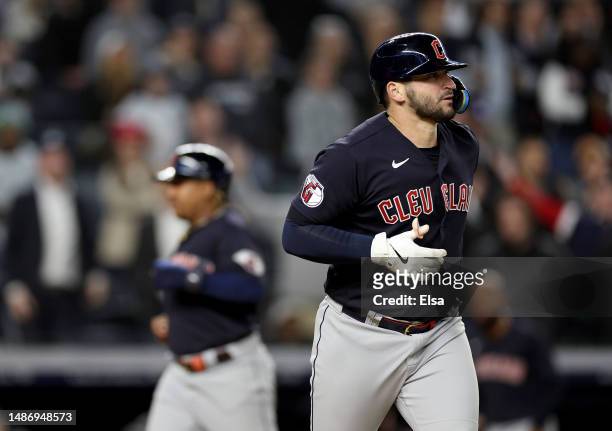 Mike Zunino of the Cleveland Guardians is walked with the bases loaded in the ninth inning as Jose Ramirez of the Cleveland Guardians scores the game...