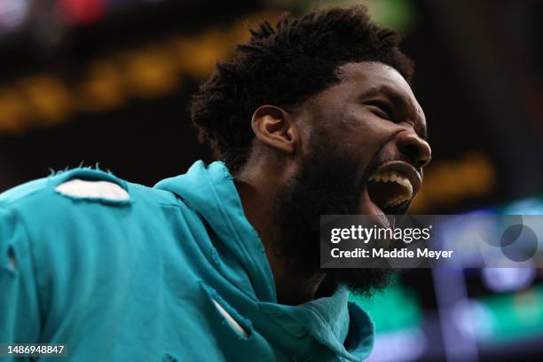 Joel Embiid of the Philadelphia 76ers celebrates from the bench after the Philadelphia 76ers defeat the Boston Celtics 119-115 in game one of the...