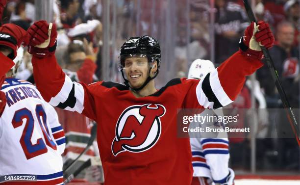 Jesper Bratt of the New Jersey Devils celebrates his empty-net goal against the New York Rangers in Game Seven of the First Round of the 2023 Stanley...