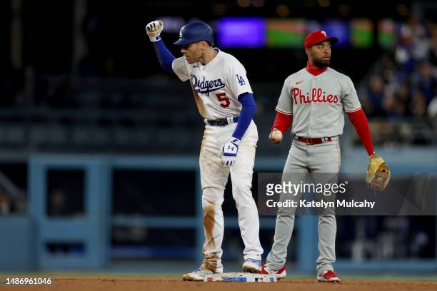Freddie Freeman of the Los Angeles Dodgers celebrates after advancing to second base on his two-run single in the fourth inning against the...