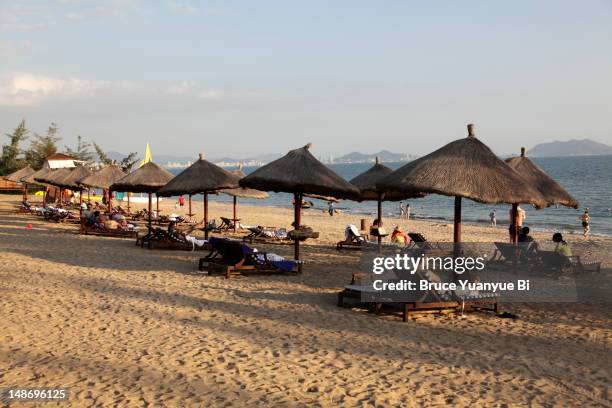 beach of sanya bay. - sanya stock pictures, royalty-free photos & images