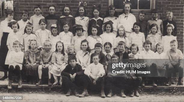 Photo postcard of students and teacher of an unidentified school in Ontario Canada ca. 1915.