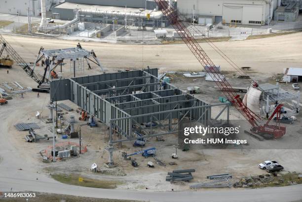 In the mobile launcher parking area behind the Vehicle Assembly Building at NASA's Kennedy Space Center in Florida, the new mobile launcher, or ML,...