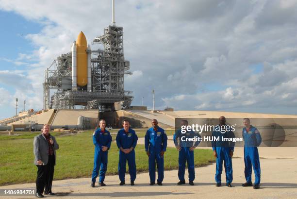 At Launch Pad 39A at NASA's Kennedy Space Center in Florida, members of space shuttle Atlantis' STS-129 crew are prepared to answer questions from...