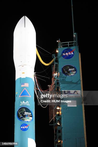 The launch gantry is rolled back to reveal the United Launch Alliance Delta II rocket with the Soil Moisture Active Passive, or SMAP, satellite...