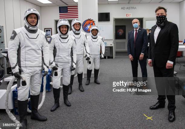 SpaceX CEO and founder Elon Musk and NASA acting administrator Steve Jurczyk visit with from left, ESA astronaut Thomas Pesquet, NASA astronaut Megan...