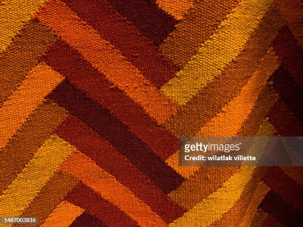 full frame overhead view of woven carpet - persian pattern stock-fotos und bilder