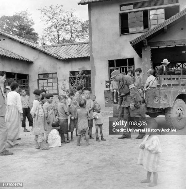 Orphans on the street, 1950. Many children lost their parents during the war. According to a UN intelligence officer, more than 40 children were...