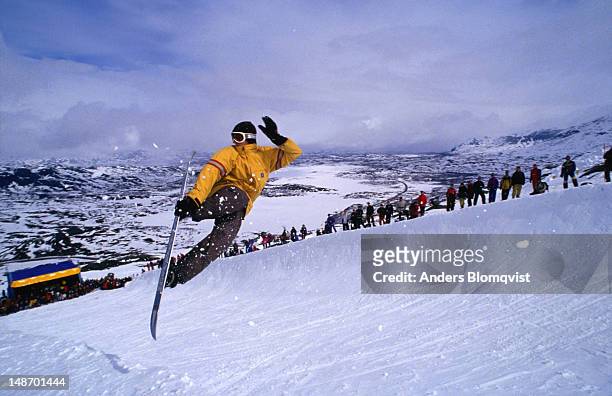 snowboarding far above the artic circle at riksgransen, near the border with norway. - sweden snowboarding stock pictures, royalty-free photos & images